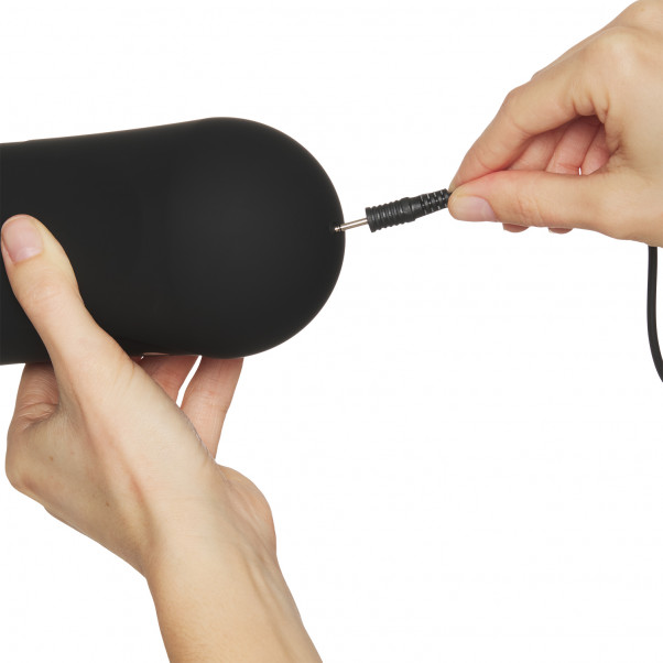 PDX Elite Moto Stroker Masturbaattori tuote kädessä 51