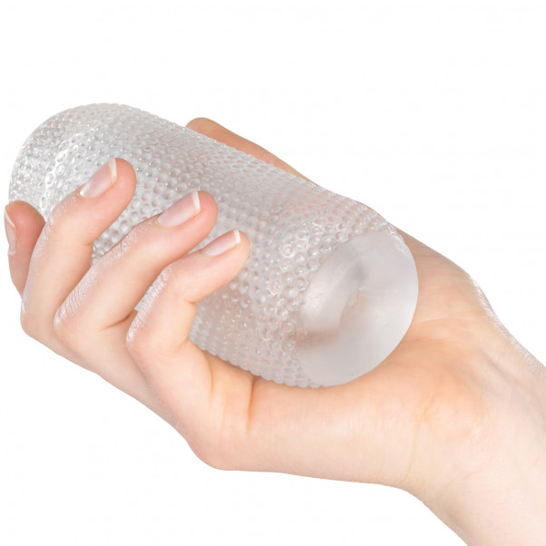 Mr. Membr Ripple Structure Läpikuultava Masturbaattori Kuva tuotteesta kädessä 50