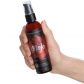 Intimate Earth Mojo Horny Goat Weed Lämmittävä Liukuvoide 120 ml tuote kädessä 50